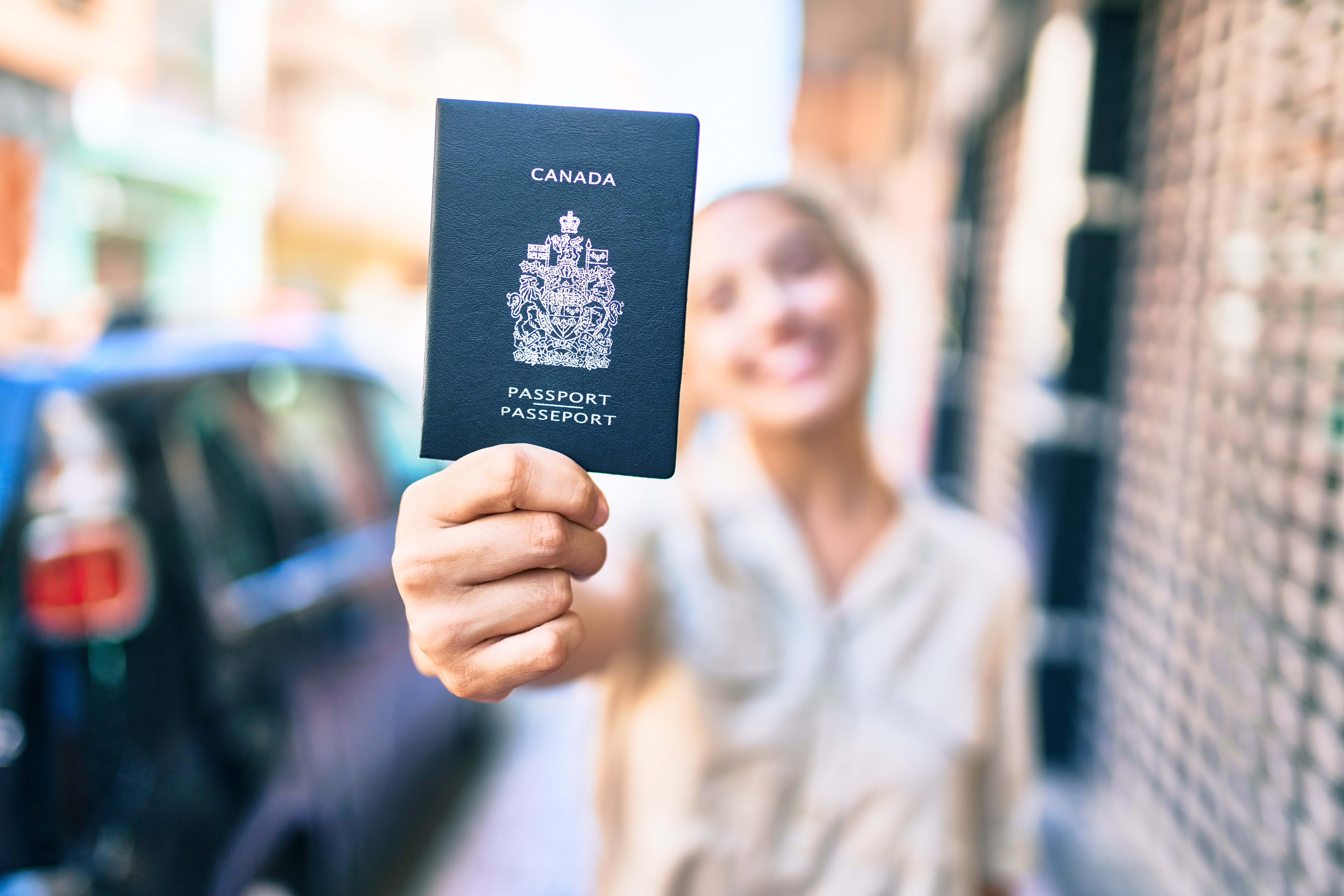 A girl with a Canadian passport who became a permanent resident in Canada